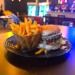 Blue Cheese and Bacon Burger with Fries The Alibi